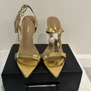 Brand new gold heels with charm